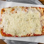 Sicilian with cheese on top